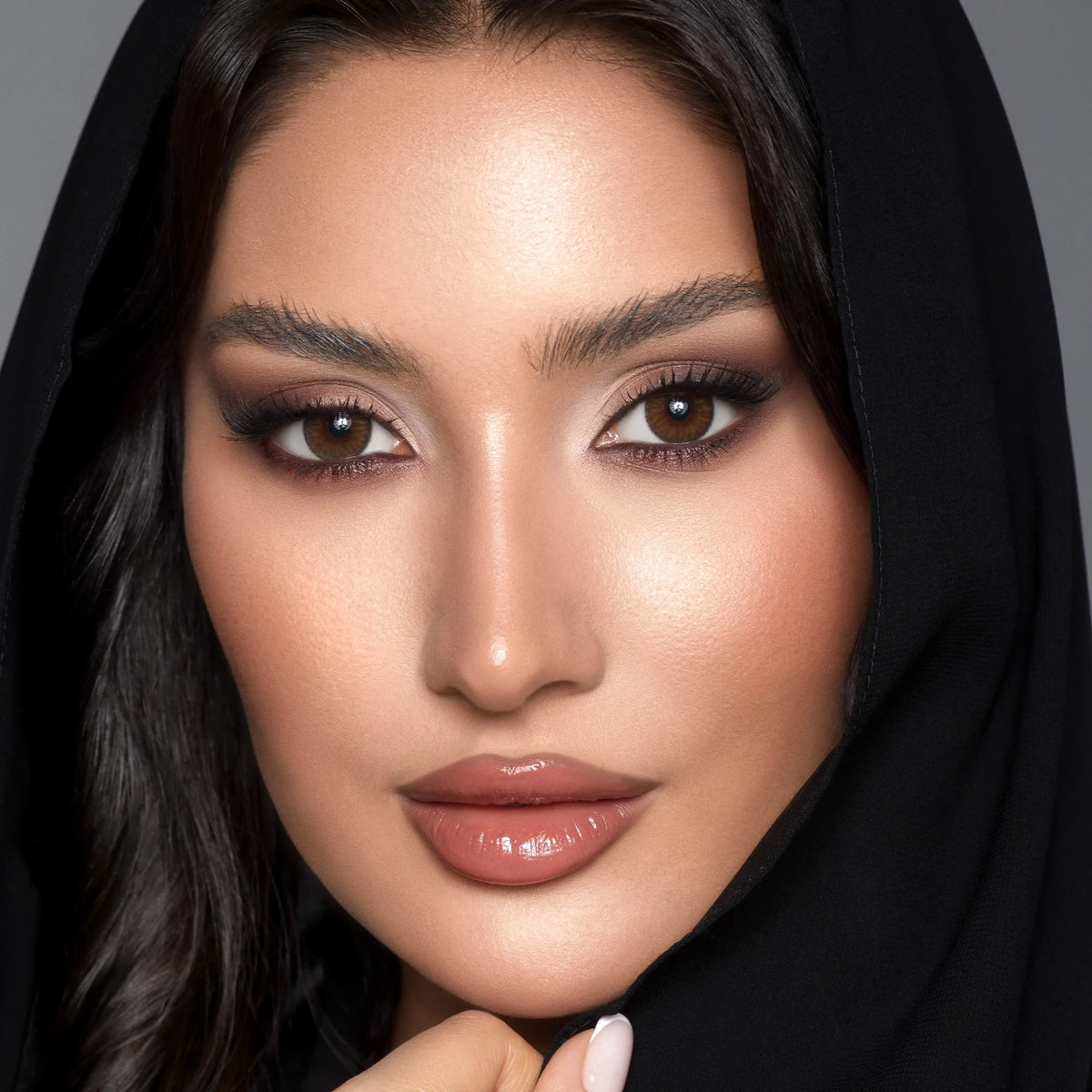A woman wearing a black hijab and Bella Contact Lenses named Nerelle.